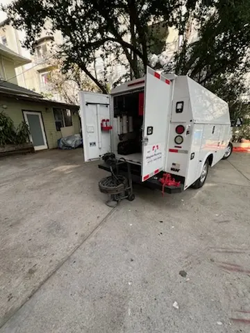 Magnet Plumbing service vehicle on-site for Grease Trap Cleaning in Mission Hills Country Club